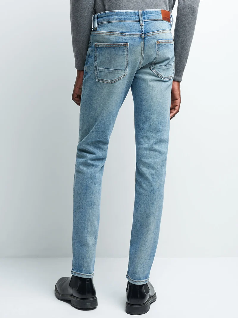 Jean denim slim en coton mélangé