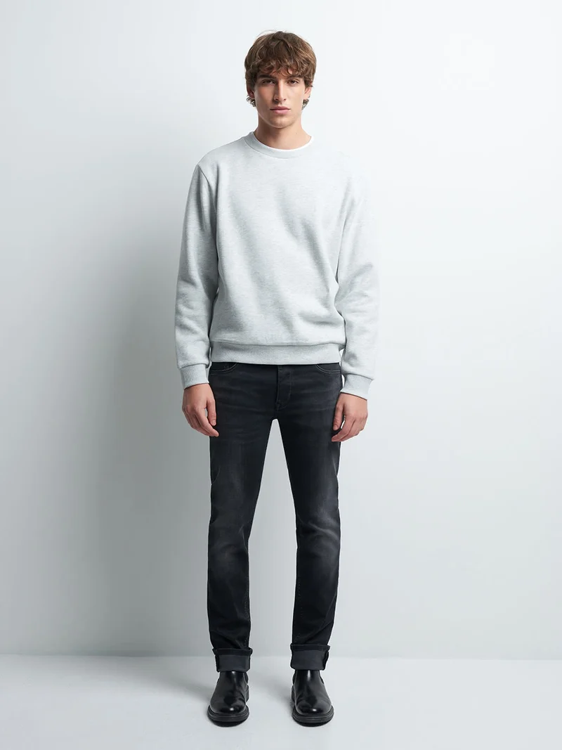 Jean denim slim en coton mélangé