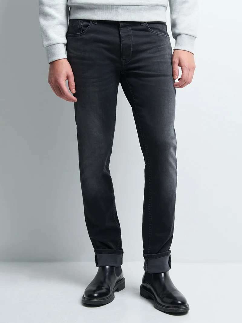 Jean denim slim en coton mélangé