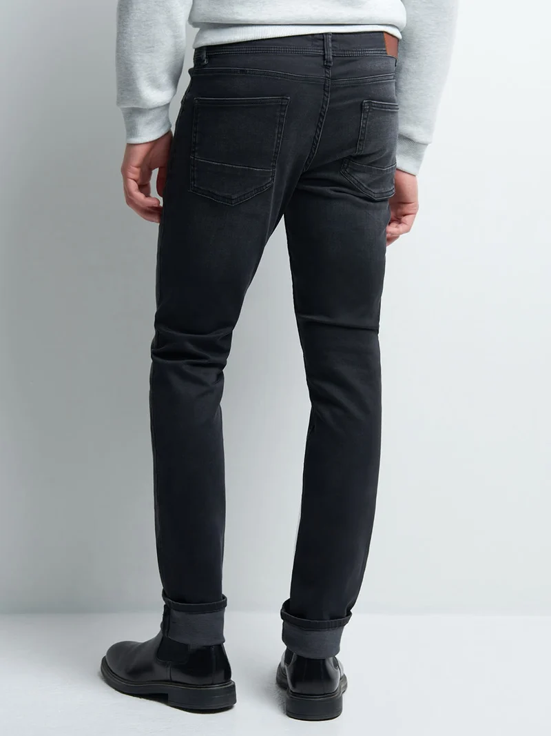 Jean denim slim en coton mélangé