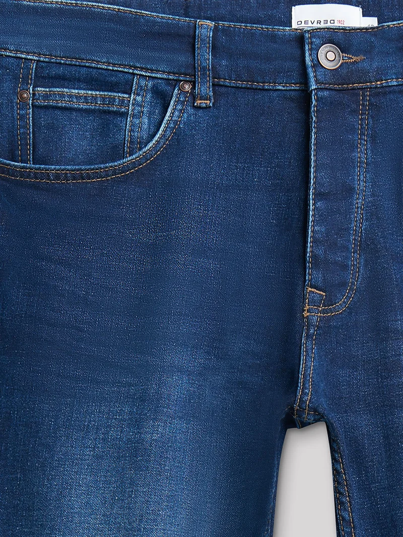 Jean denim slim en coton mélangé