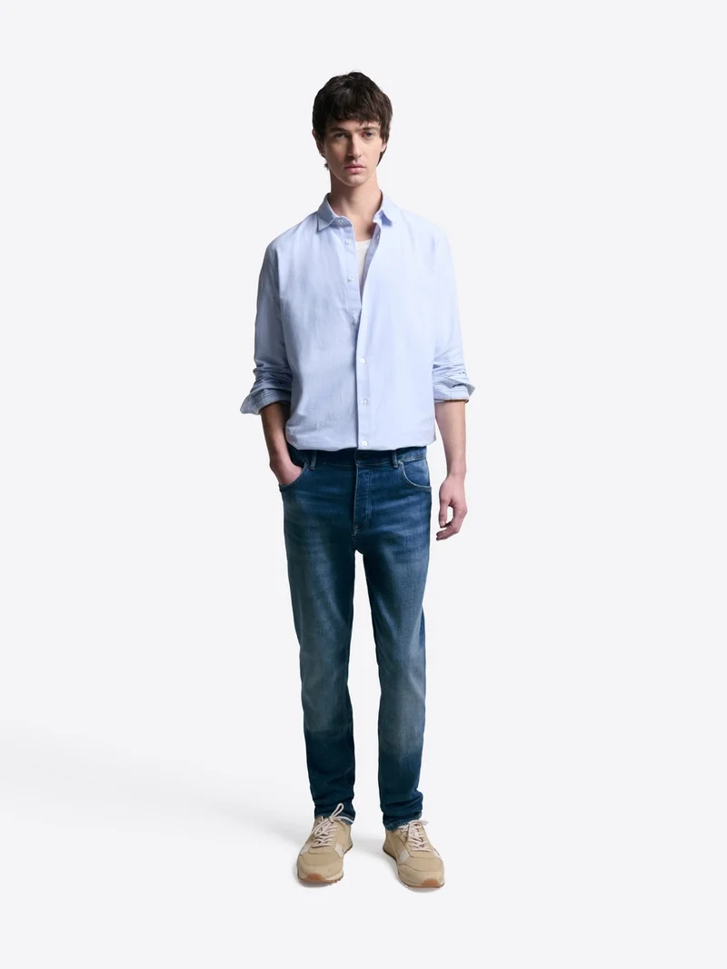 Jean denim faux-uni en coton mélangé