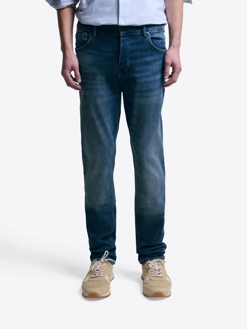 Jean denim faux-uni en coton mélangé