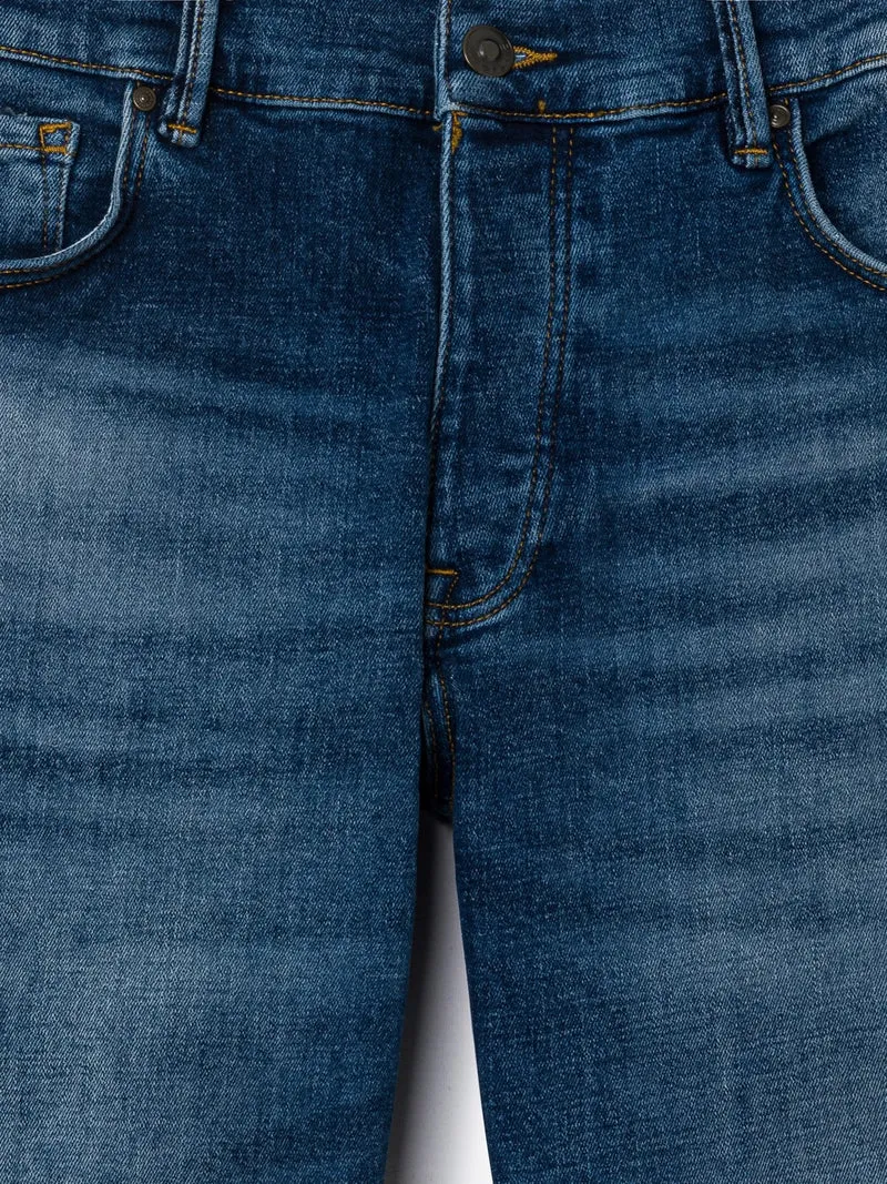 Jean denim faux-uni en coton mélangé