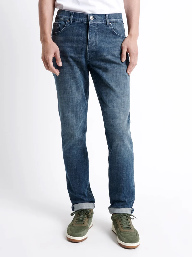 Jean denim délavé en coton stretch