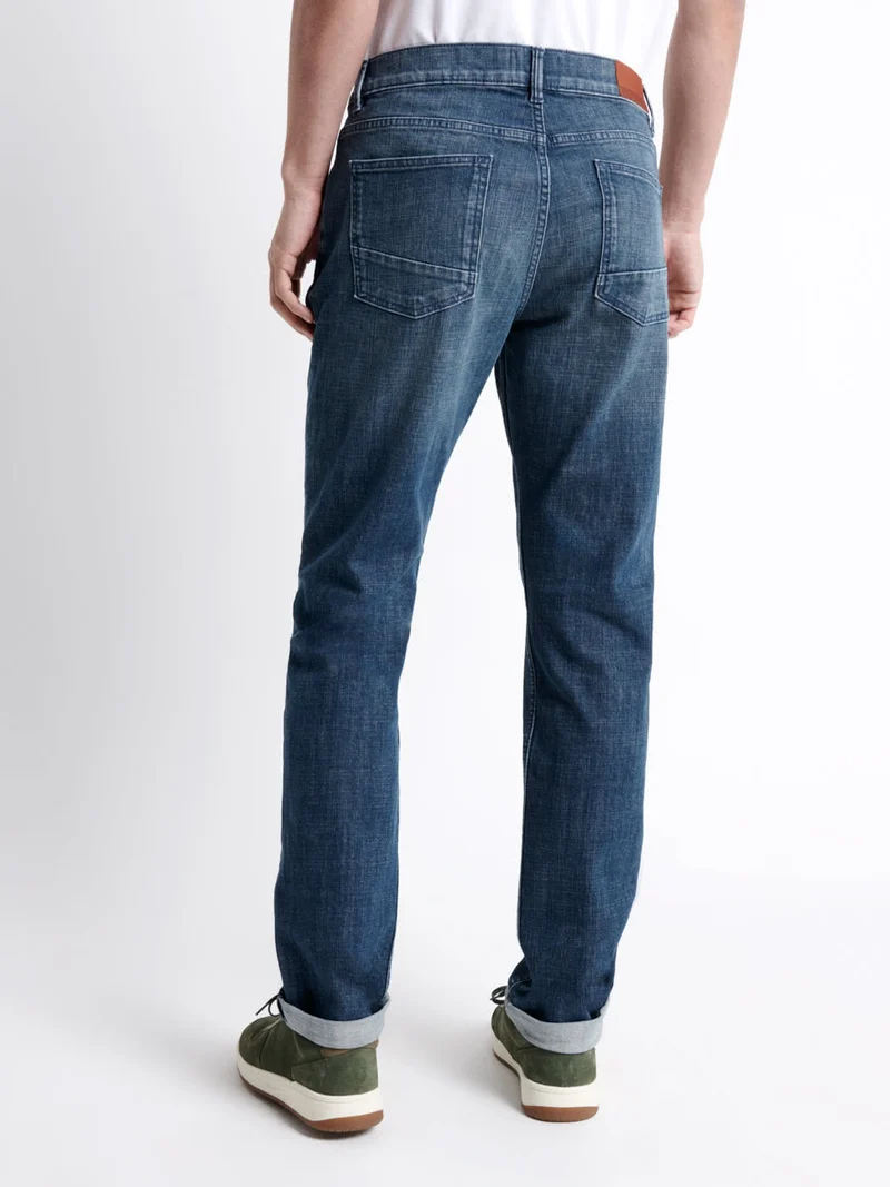 Jean denim délavé en coton stretch