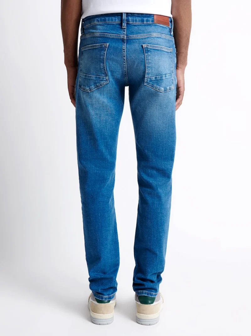 Jean denim regular délavé
