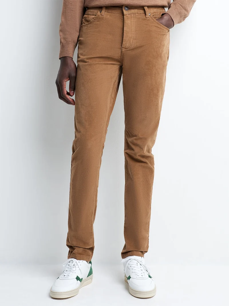 Jean couleur slim en coton élasthane uni