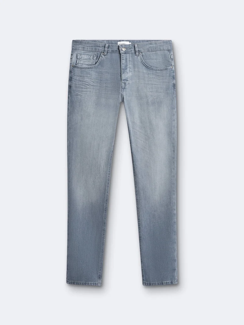 Jean couleur slim en coton élasthane uni