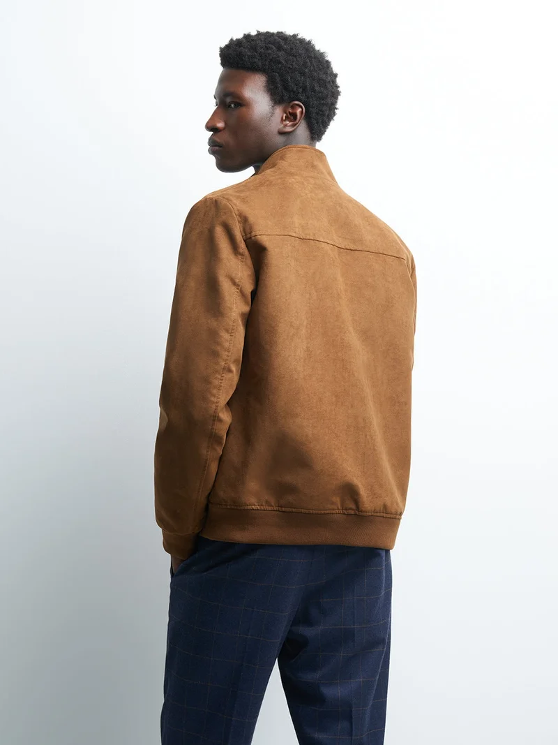 Blouson suédine col montant