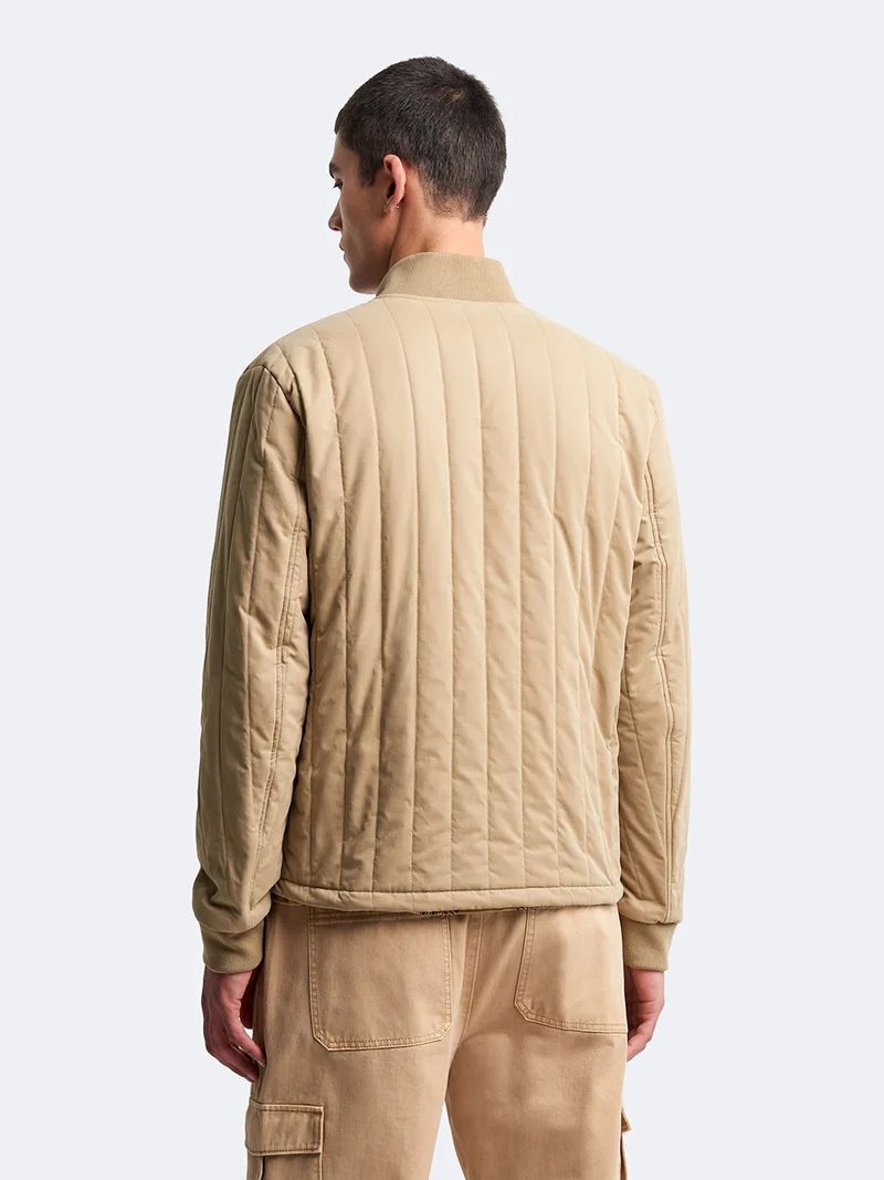 Blouson bomber matelassé col teddy