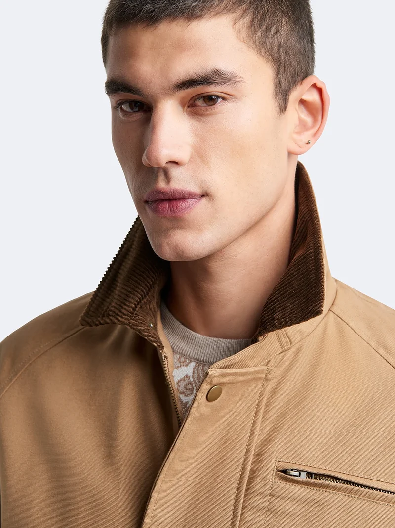 Blouson zippé col velours côtelé