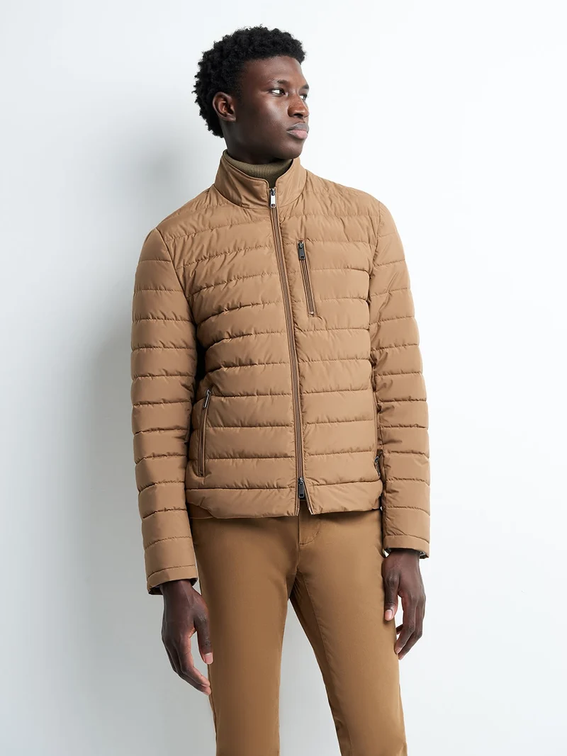 Blouson zippé matelassé col montant