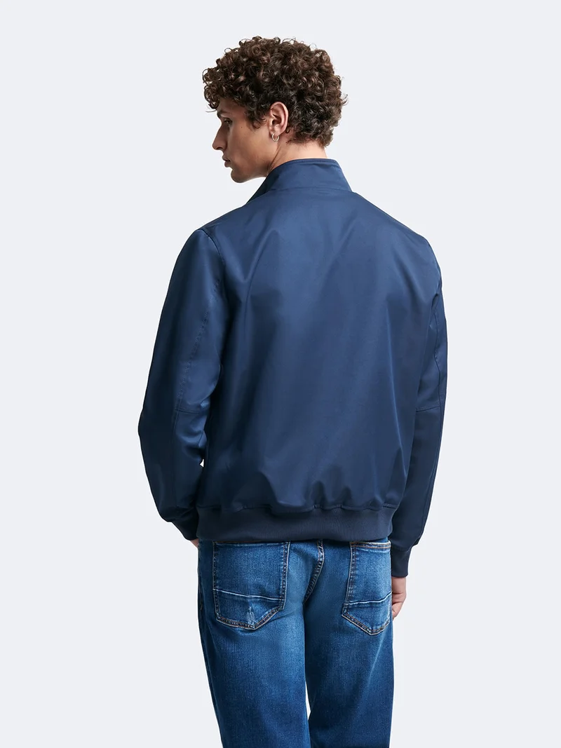 Blouson zippé col montant