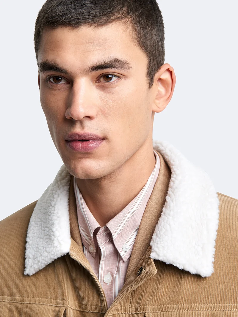 Blouson en velours côtelé col sherpa