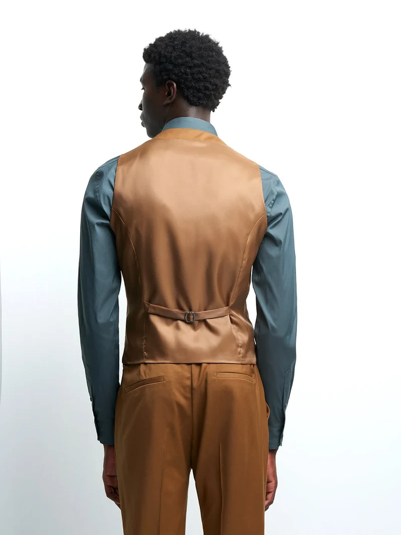 Gilet coordonnable en laine uni