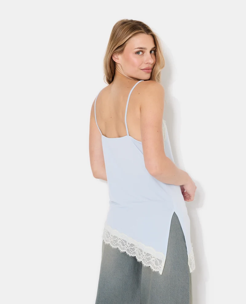 Top asymétrique en maille stretch et dentelle