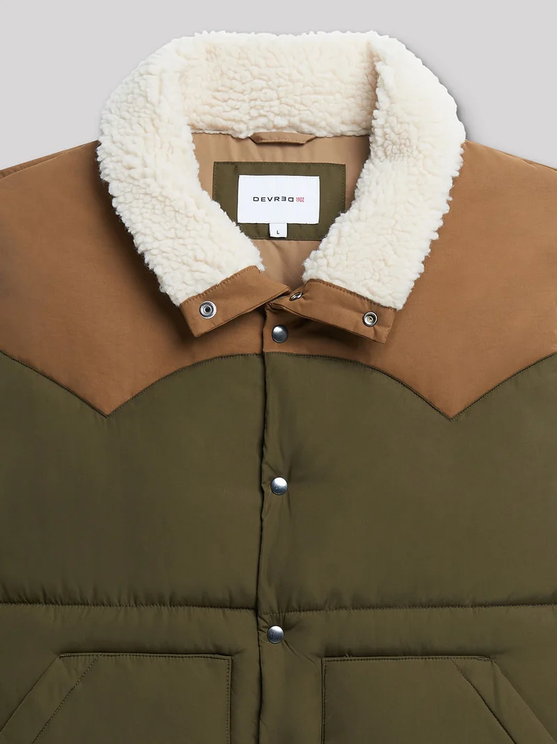 Gilet sans manche col montant