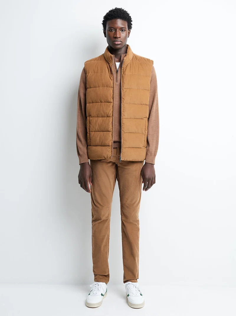 Gilet sans manche zippé col montant