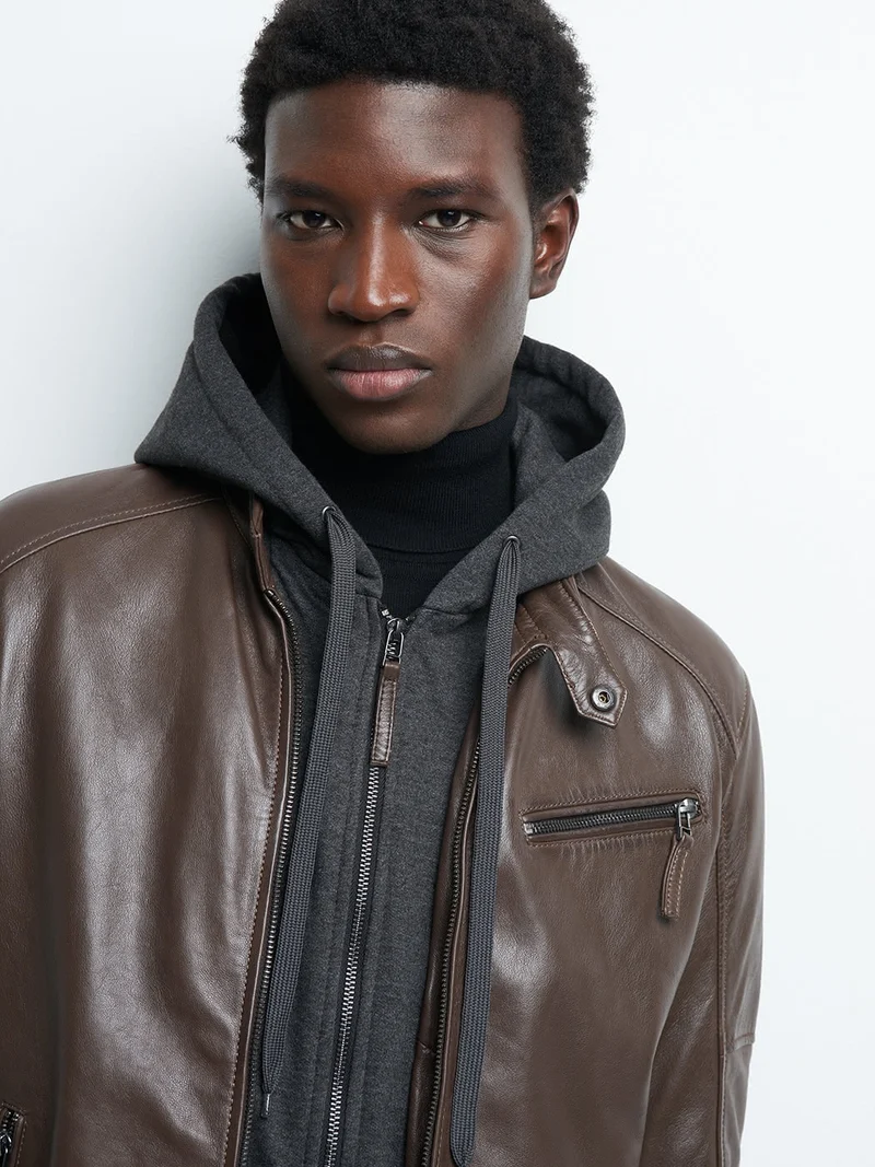 Blouson en cuir à capuche