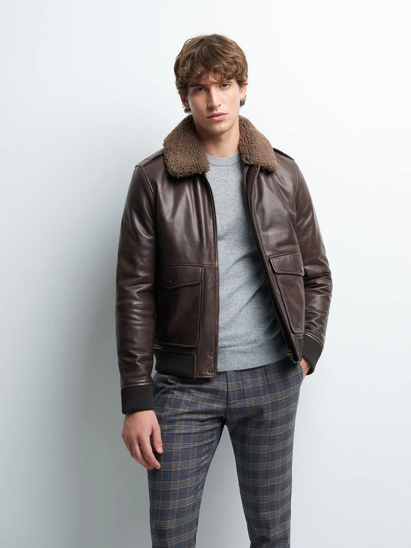 Blouson en cuir col sherpa