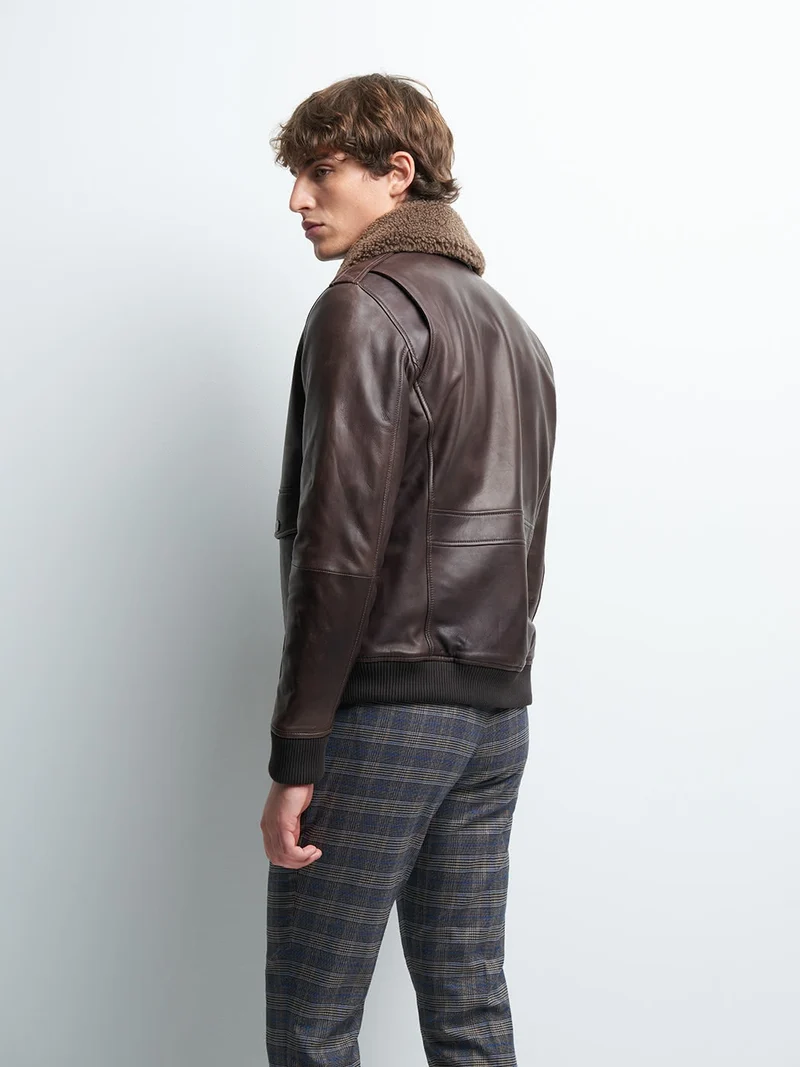 Blouson en cuir col sherpa