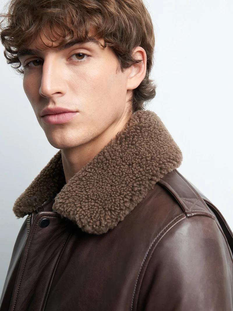 Blouson en cuir col sherpa