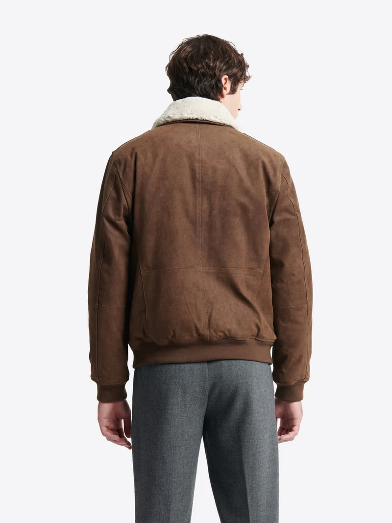 Blouson col sherpa en cuir