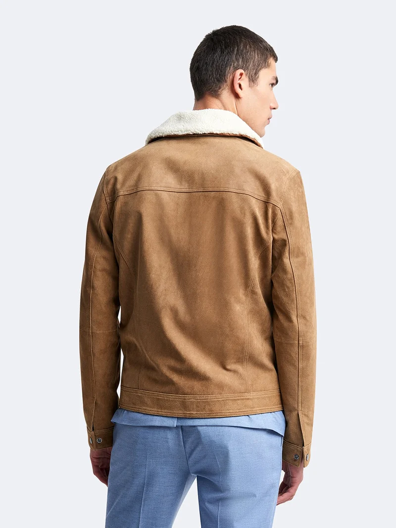 Blouson en cuir col sherpa