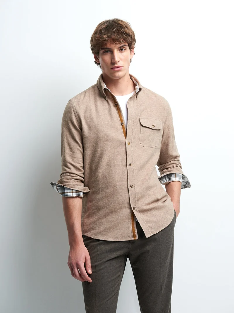 Chemise slim faux uni