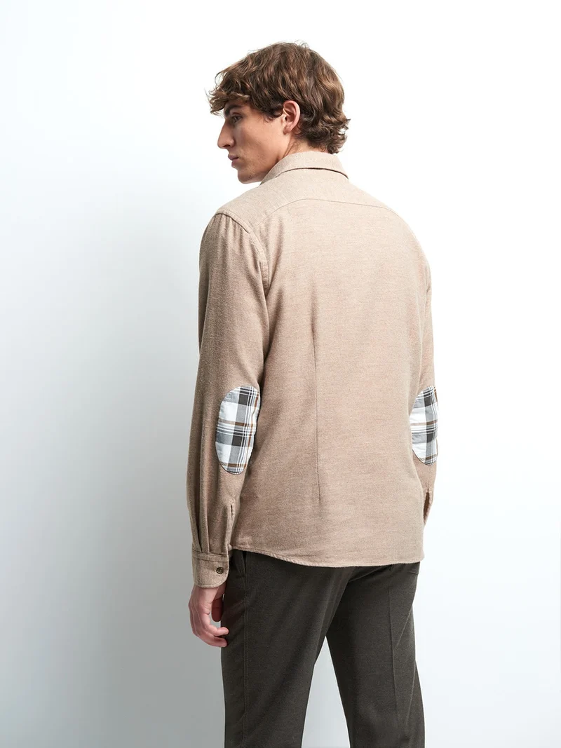 Chemise slim faux uni
