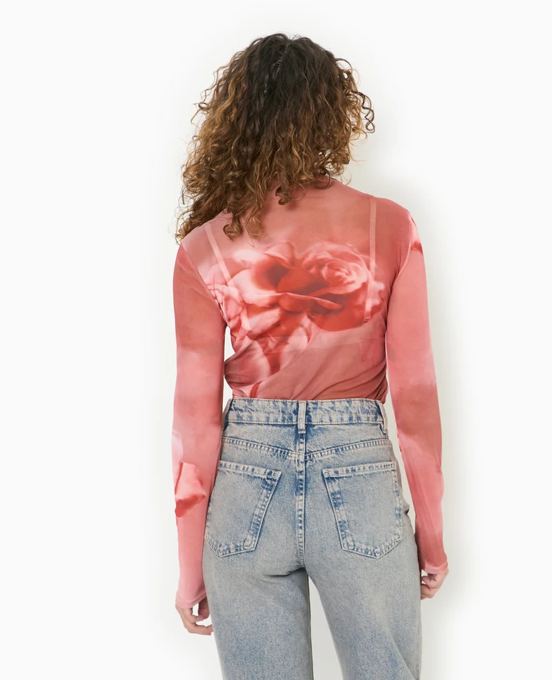 Top manches longues en résille motif roses