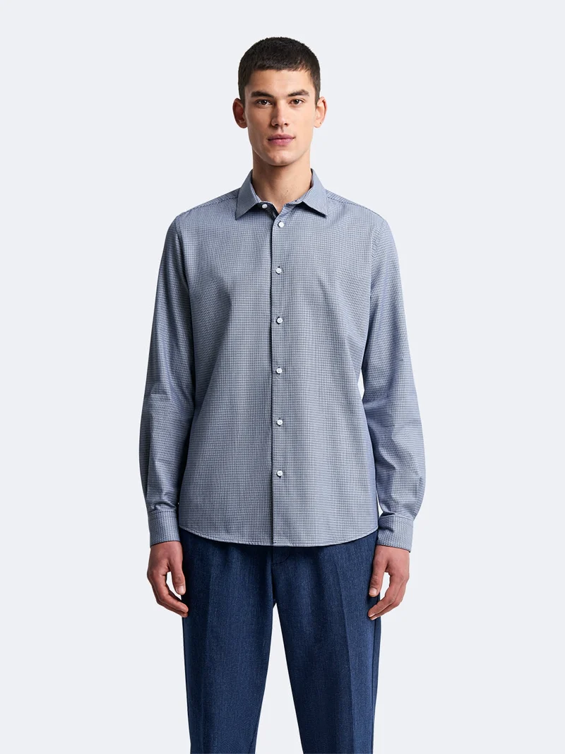 Chemise slim faux uni