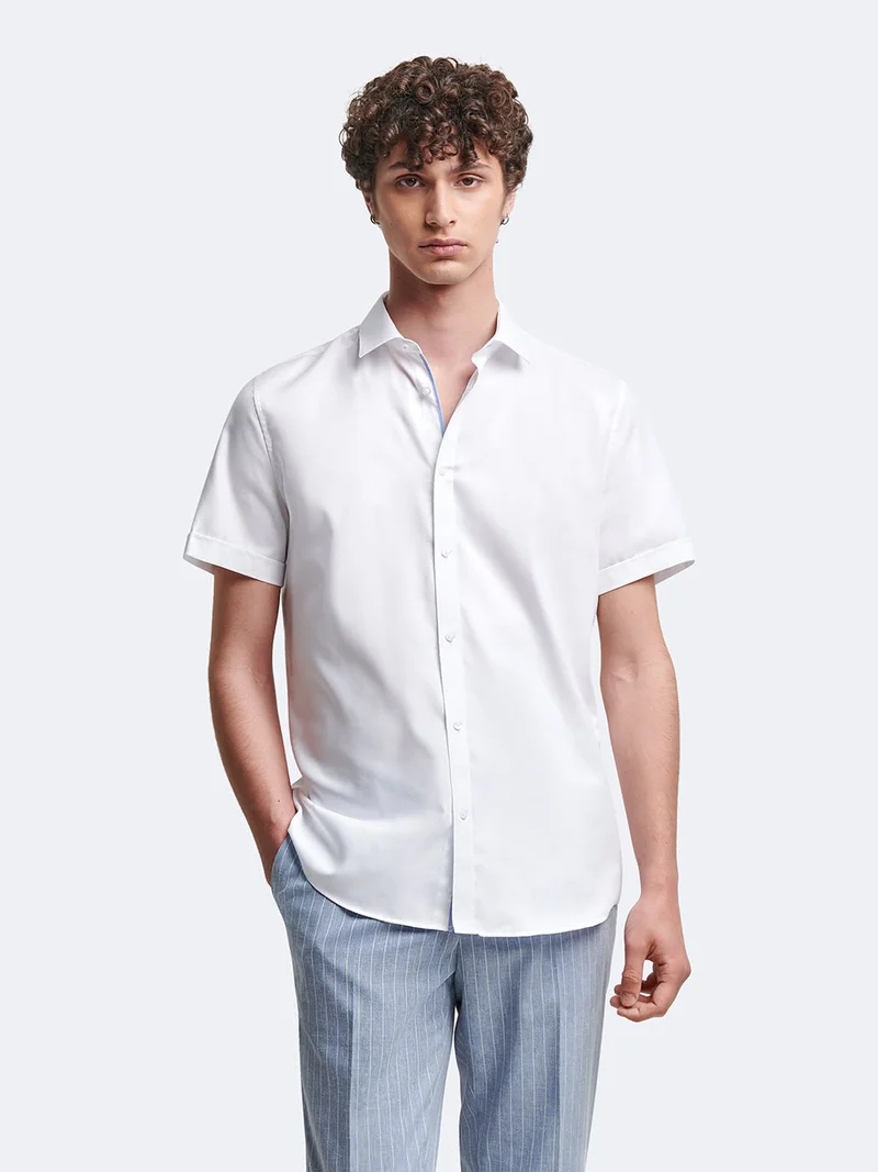 Chemise à manches courtes slim unie