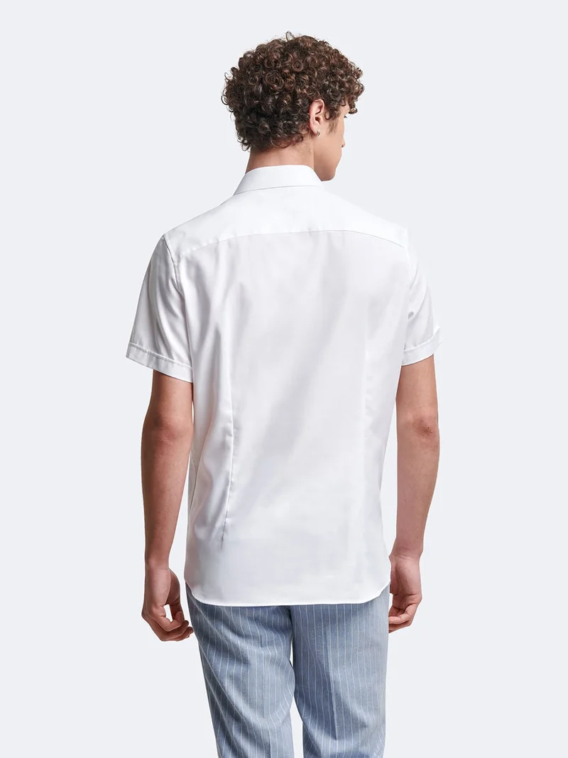 Chemise à manches courtes slim unie