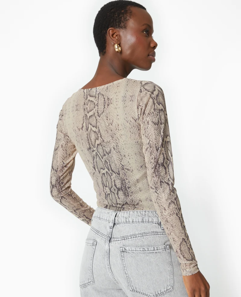 Top manches longues en résille motif python