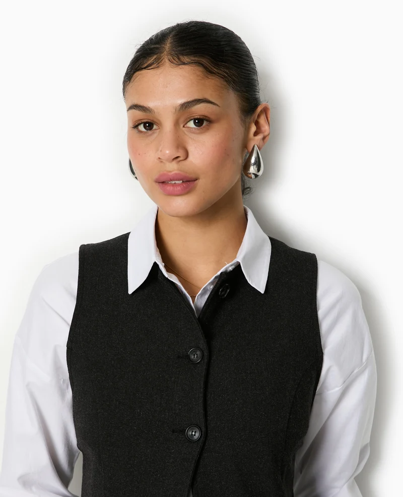 Veste sans manches façon gilet de barman