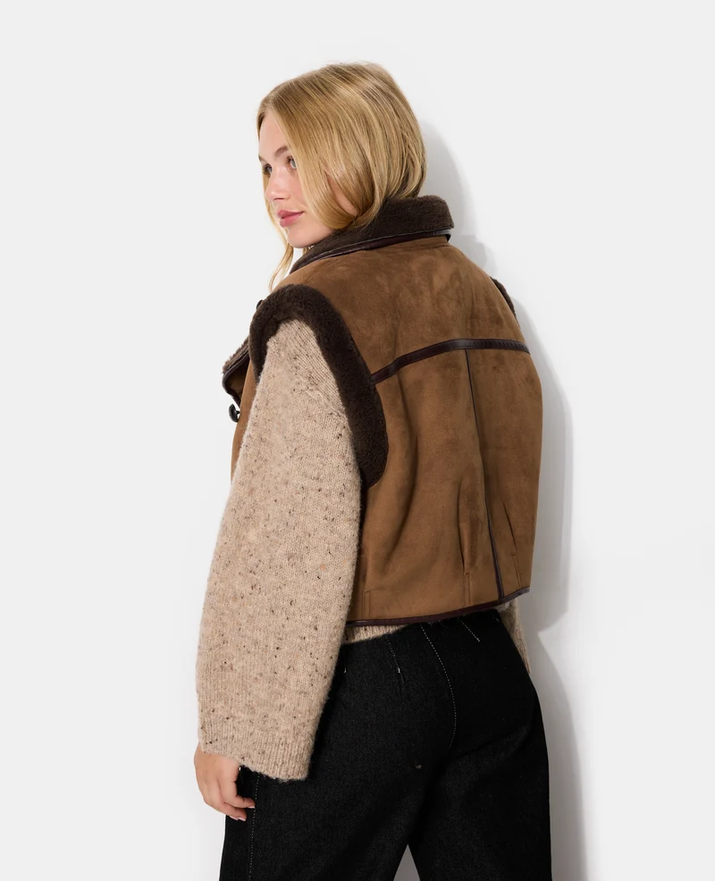 Blouson sans manches façon peau lainée