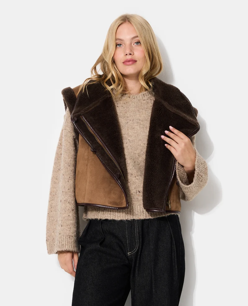 Blouson sans manches façon peau lainée
