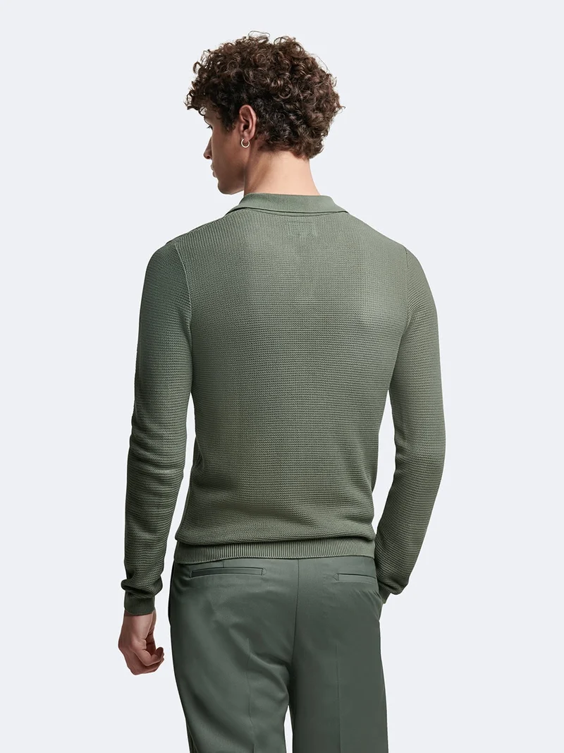 Pull col polo en v