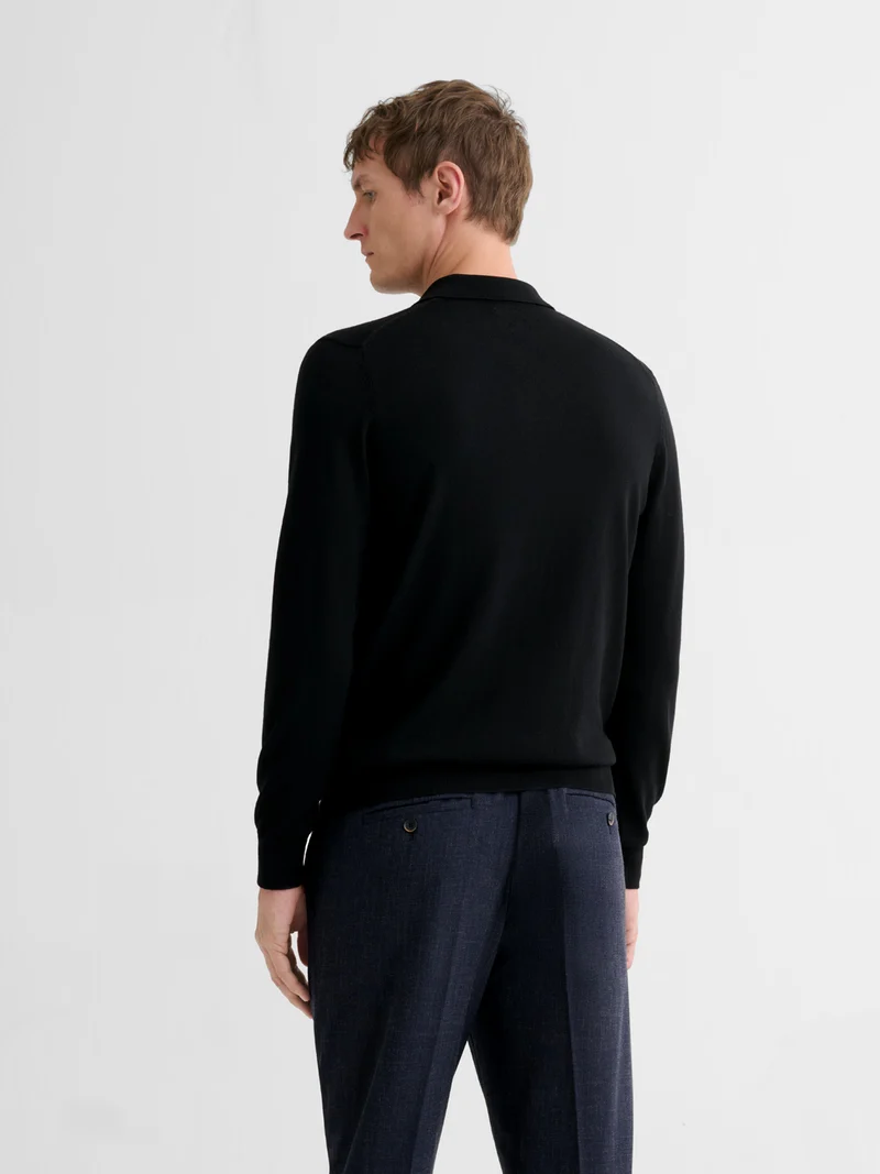 Polo boutonné en laine Mérinos