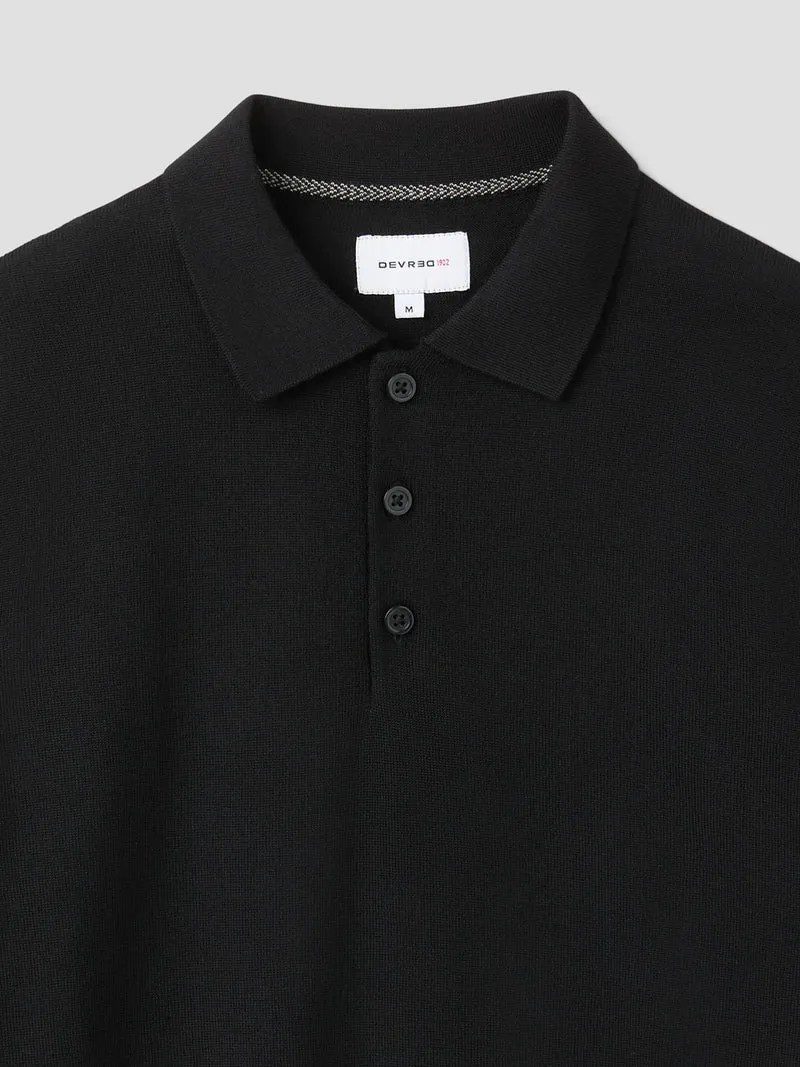 Polo boutonné en laine Mérinos
