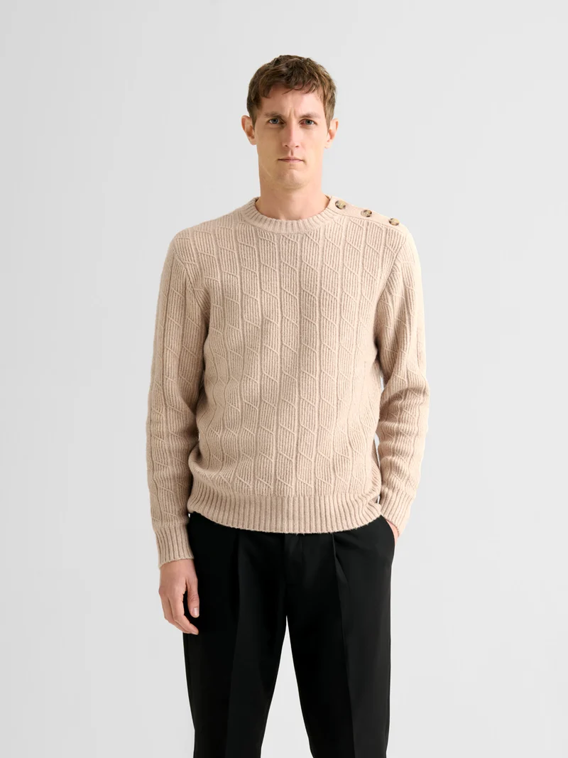Pull col rond maille torsadée