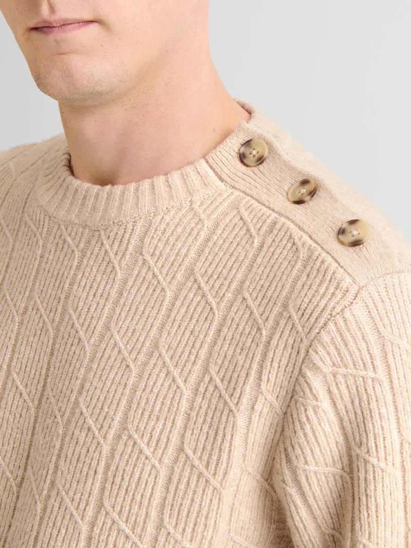 Pull col rond maille torsadée