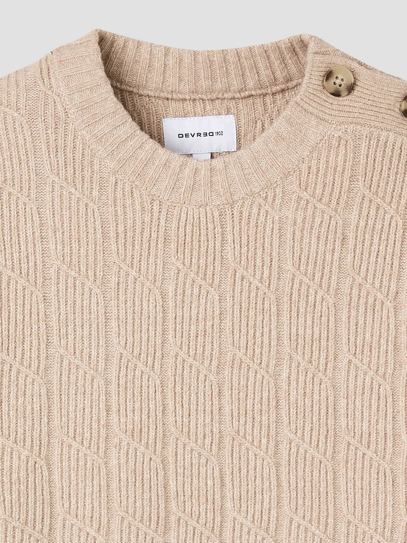 Pull col rond maille torsadée