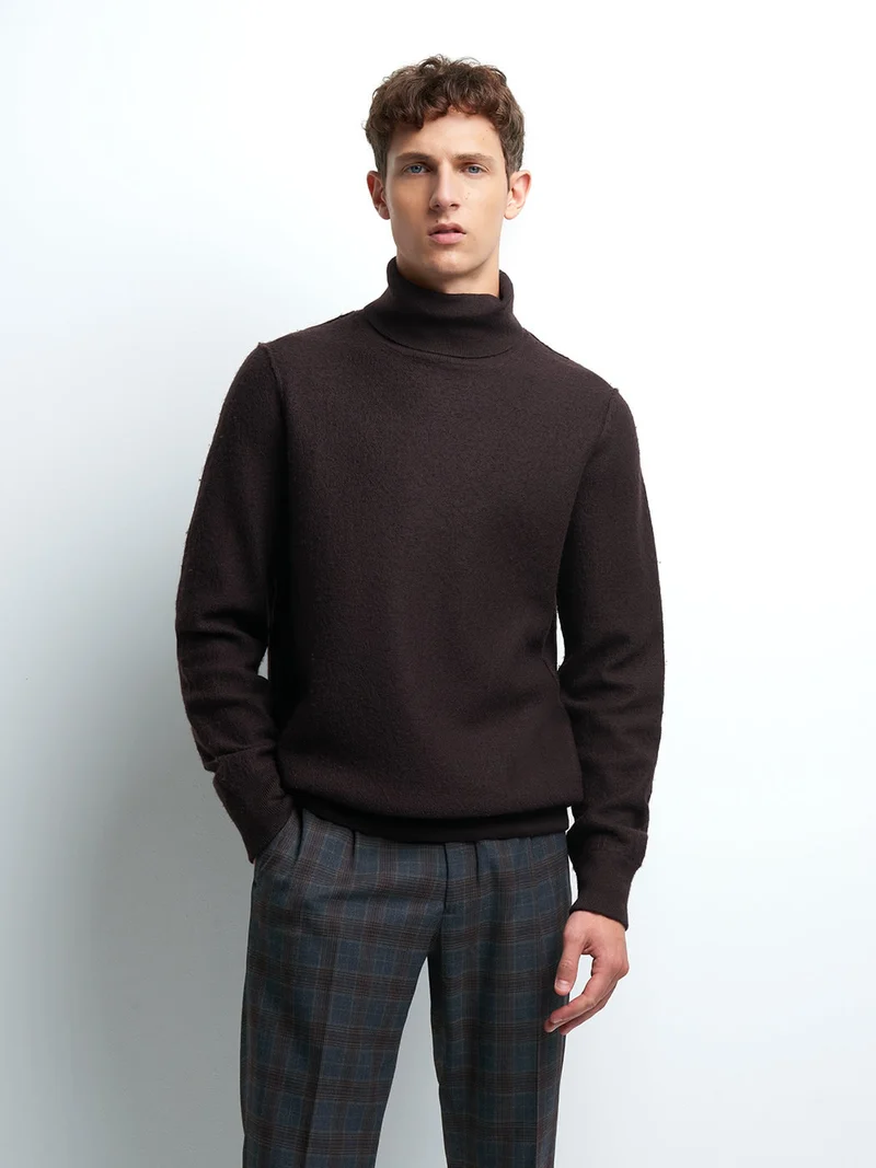 Pull col roulé