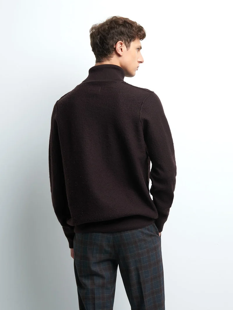 Pull col roulé