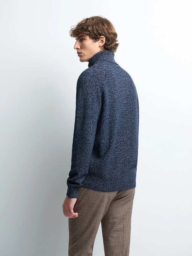 Pull col roulé