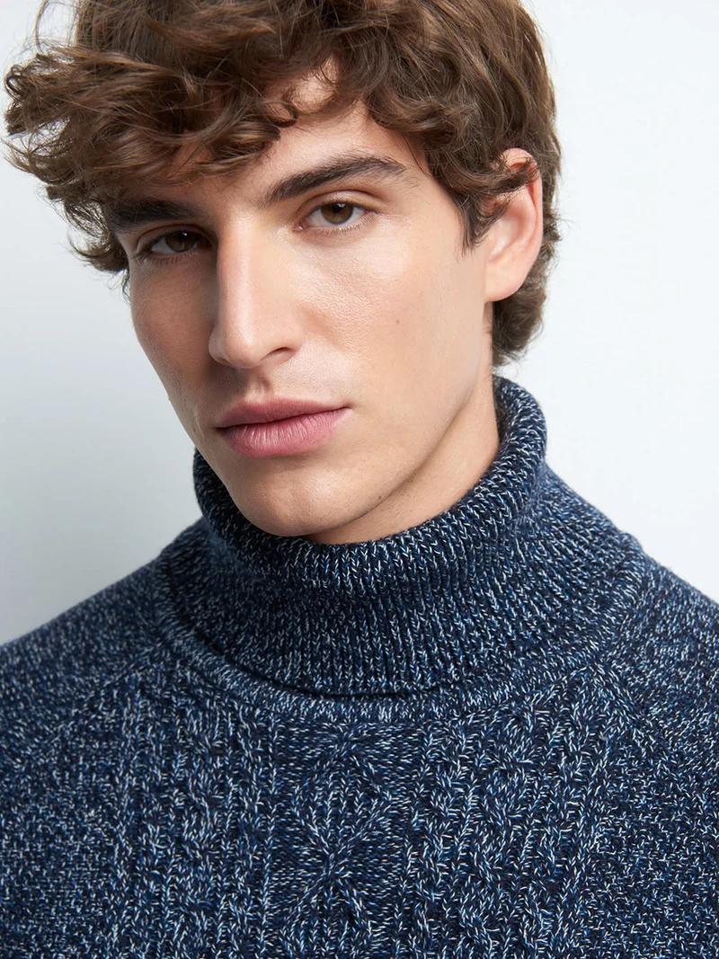 Pull col roulé