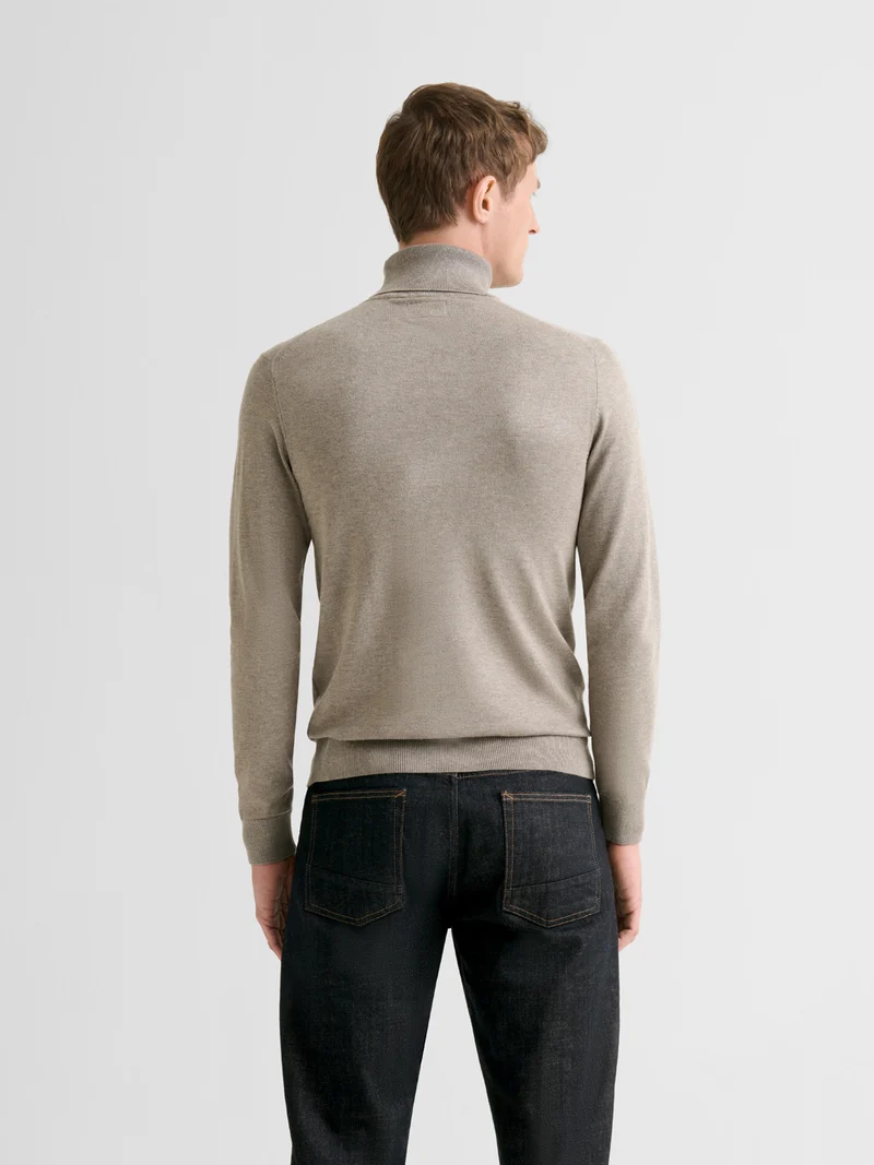 Pull col roulé en jersey